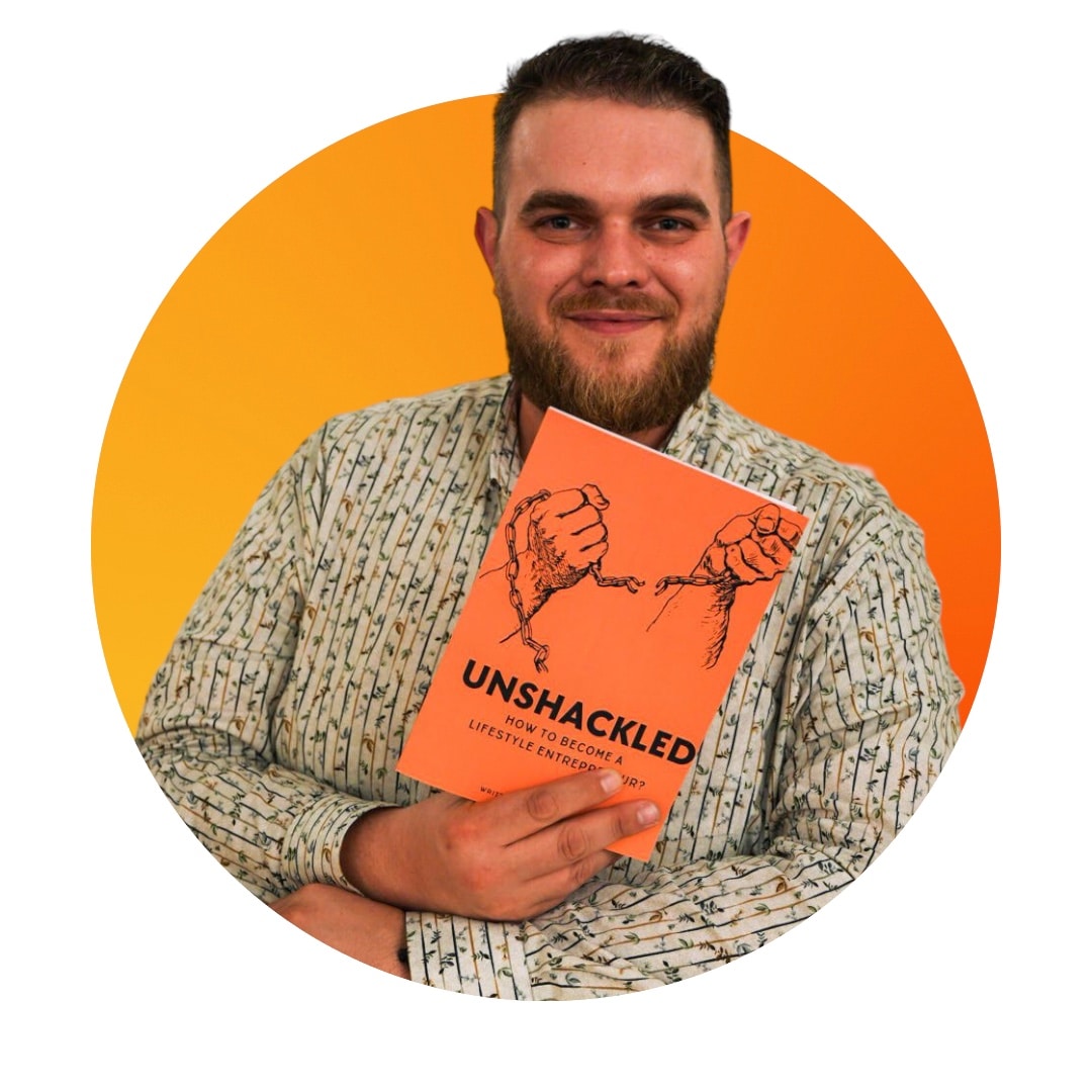 Nick Hilderson with his book Unshackled